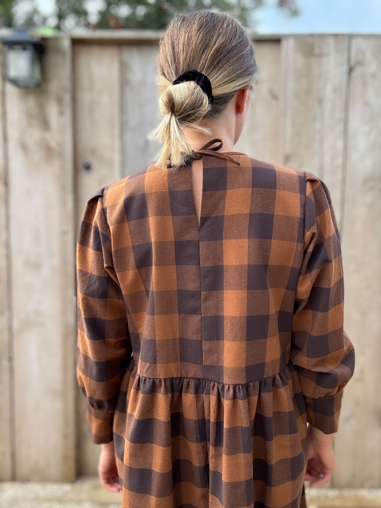 The Fern Dress in navy and chestnut check. Cuff detailed midi dress.