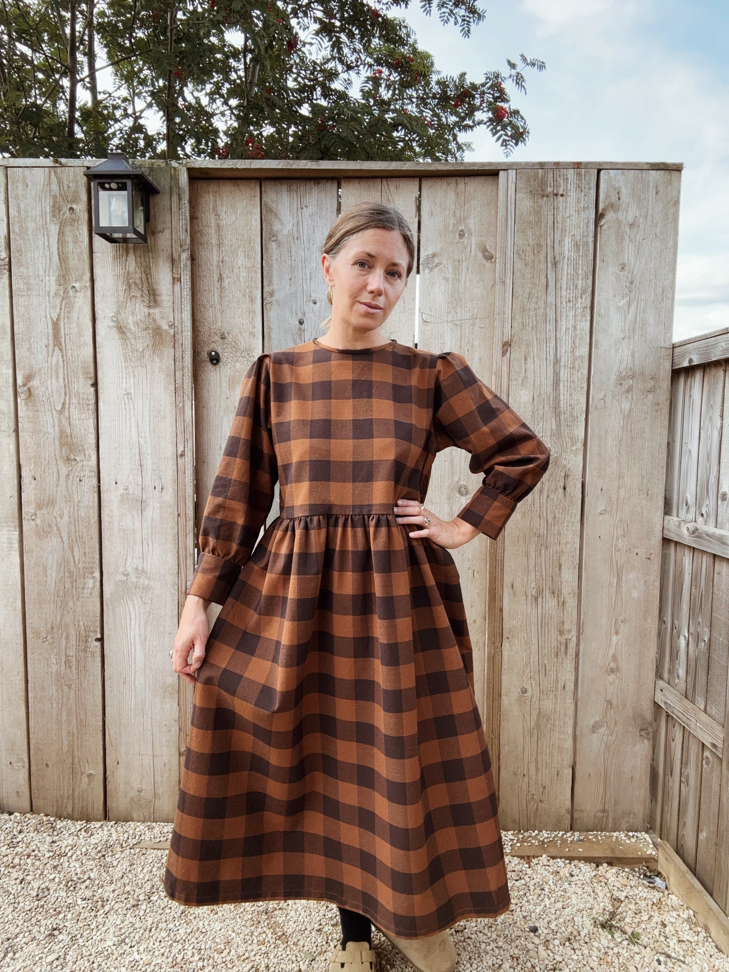 The Fern Dress in navy and chestnut check. Cuff detailed midi dress.