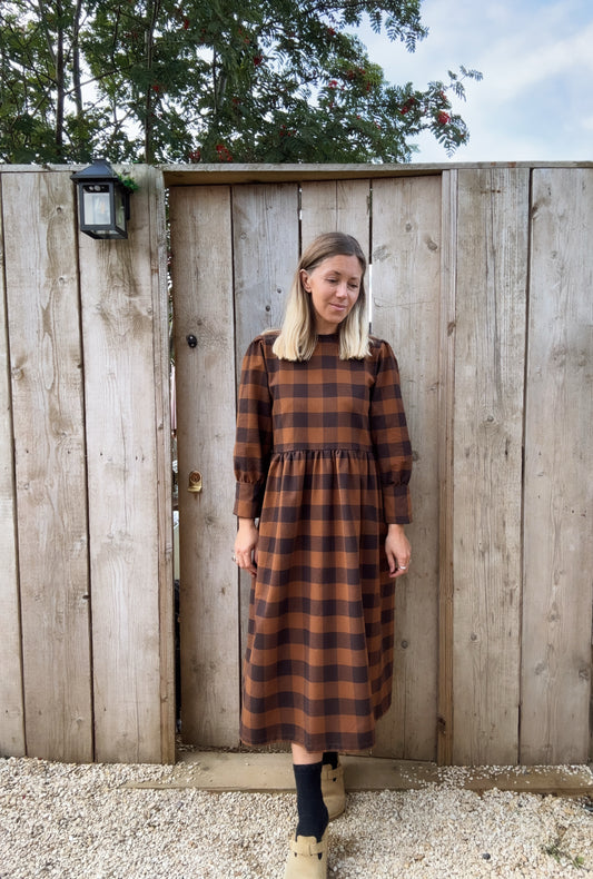 The Fern Dress in navy and chestnut check. Cuff detailed midi dress.