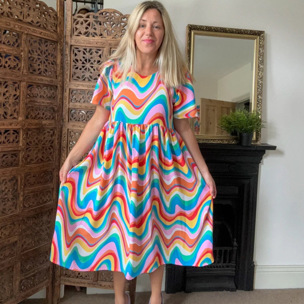 Handmade short sleeve rainbow multicolour midi dress. Made from deadstock fabric. Size 12.