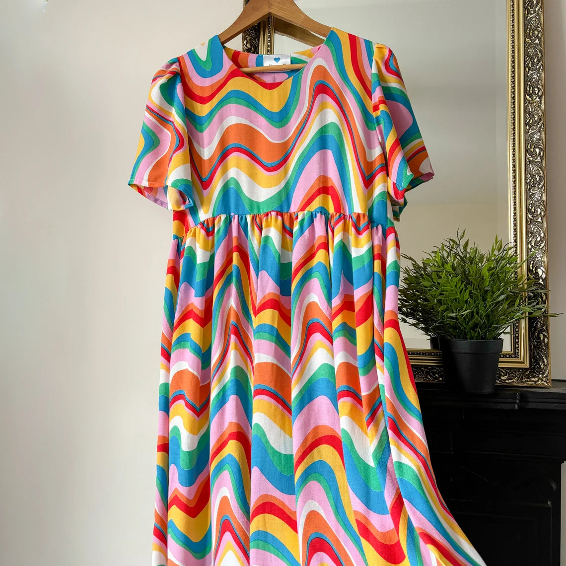 Handmade short sleeve rainbow multicolour midi dress. Made from deadstock fabric. Size 12.